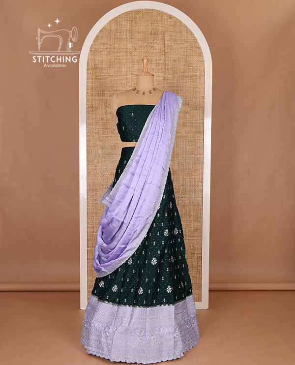 Dark Green half-saree, floral motifs embroidered semi raw silk top, matching embroidered blouse, and contrast scallop embroidered georgette dhavani