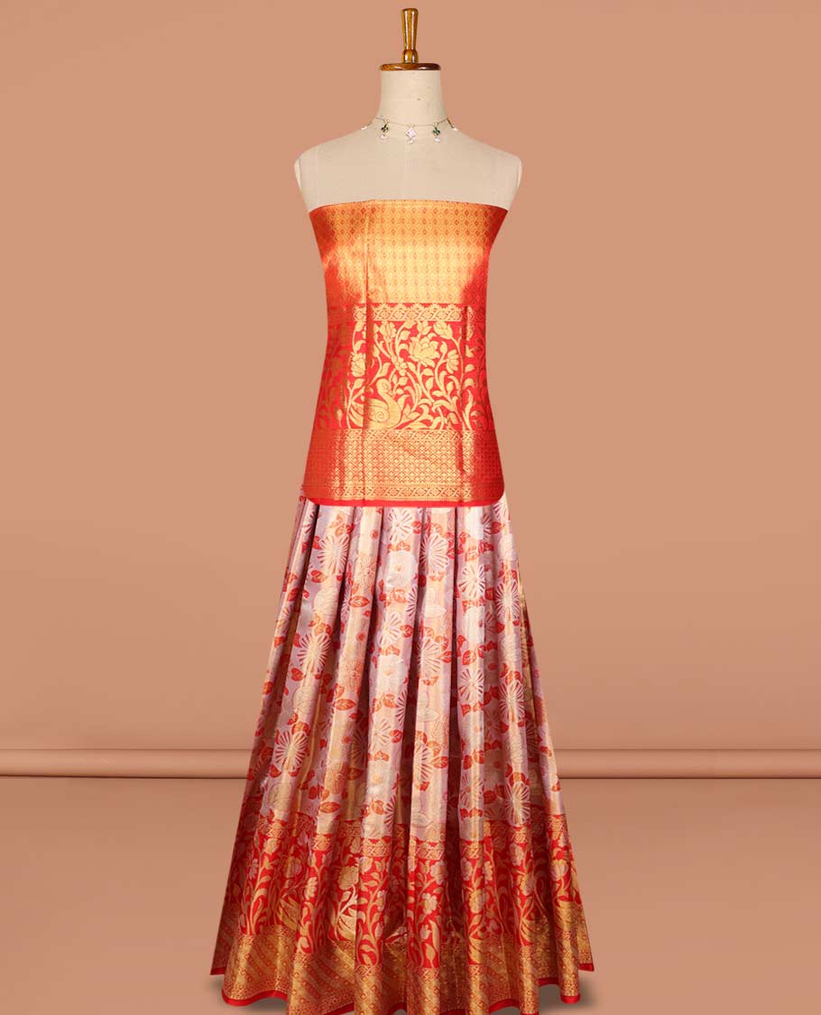 Light orange floral jacquard pure silk half saree with contrast floral zari design border, zari design blouse & floral zari design dhavani