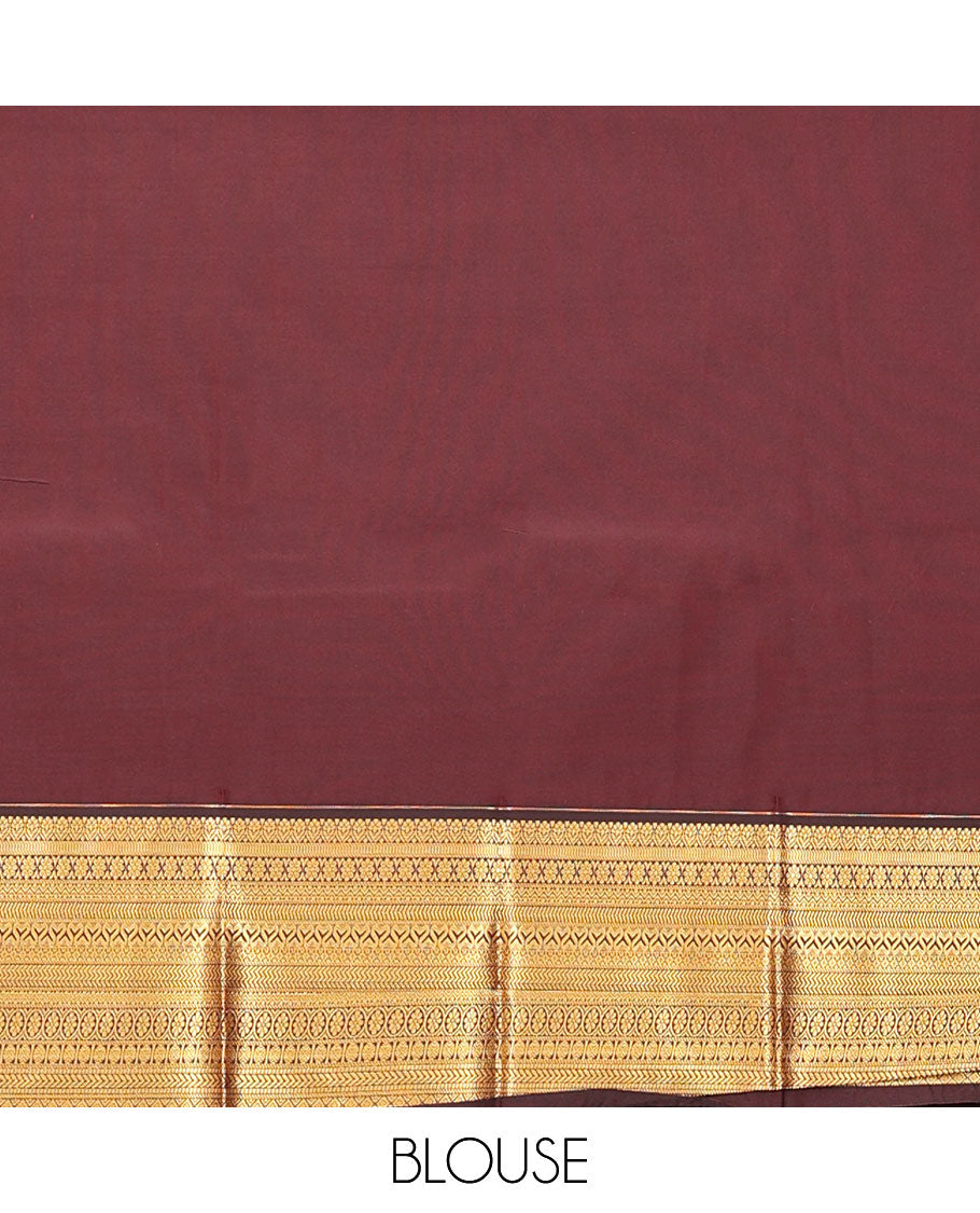 Chocolate Brown Budget Silk Saree, Elevated with Muthu Stripes, and Peacock Buttas on Its Body, Highlighted by a Traditional Zari Design Border, Pallu Delicately Woven with Floral Jaal Designs, and Paired with a Matching Blouse