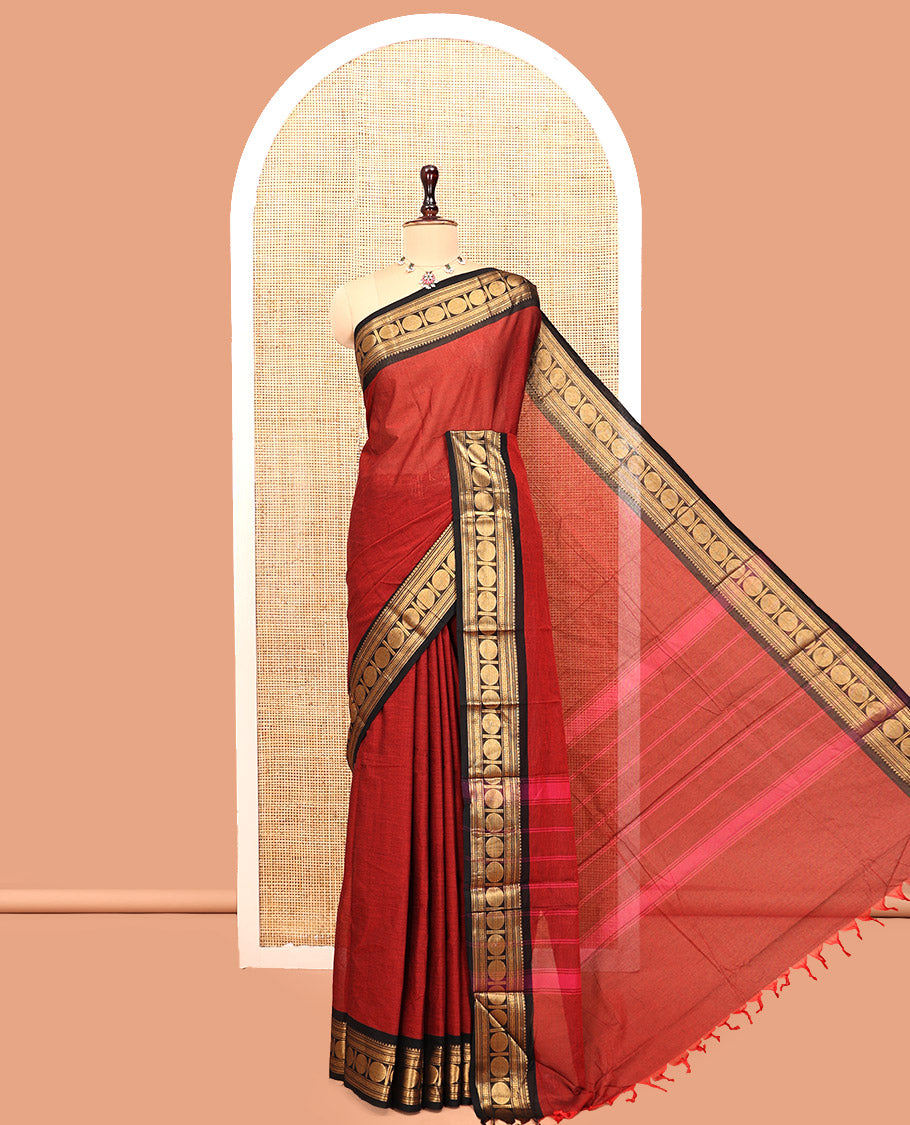 Maroon Plain Chettinad Cotton Saree, Complemented by a Contrast Rudraksham Design Traditional Zari Border, Subtly Striped Pallu, and Paired with a Matching Blouse