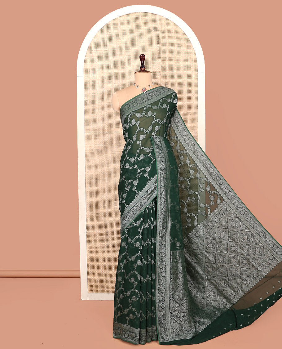 Green Georgette Saree, Adorned with Floral Jaal Jacquard, Highlighted by Floral Creeper Border, Grand Jaal Pallu, and a Matching Blouse