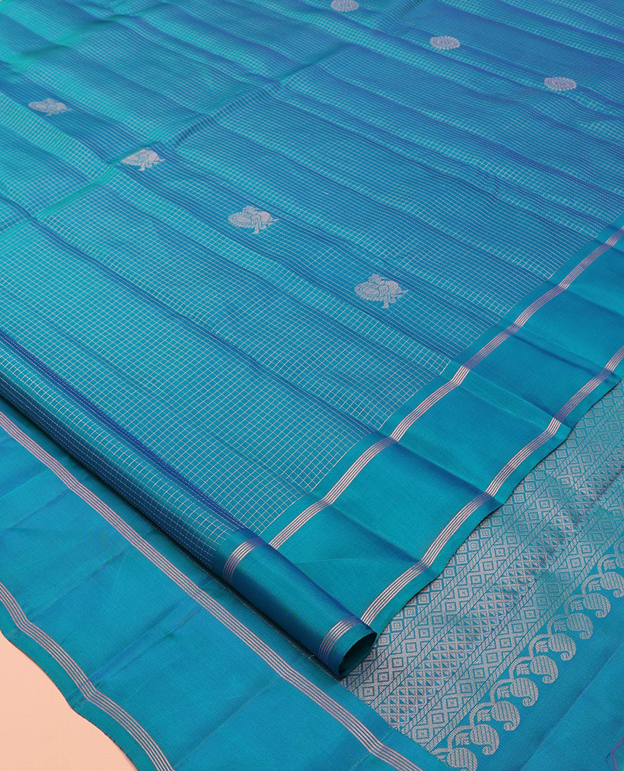 Blue Vasundhara Lite Silk Mix Saree, Adorned with Mayil Buttas and Checks, a Bodi Border, Grand Jaal Pallu, and a Matching Blouse