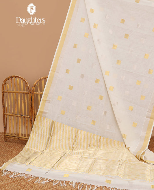 White geometric design kasavu saree with self gold zari border & gold striped pallu