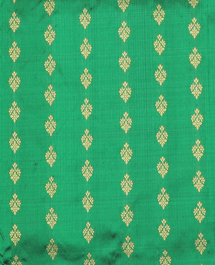 Green floral buttas silk half saree with contrast thilakam mokku, paun design border, zari design blouse & zari design border dhavani
