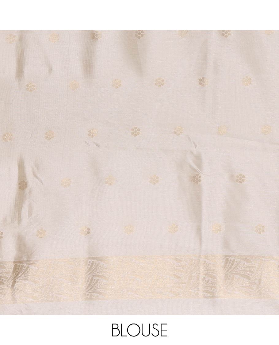 Cream Semi Tussar Saree Embellished with Floral Vine Embossed and Zari Buttas, Gleaming Border of Geometric Designs, Pallu Majestically Detailed with Geometric Designs in Zari, and Paired with a Matching Blouse