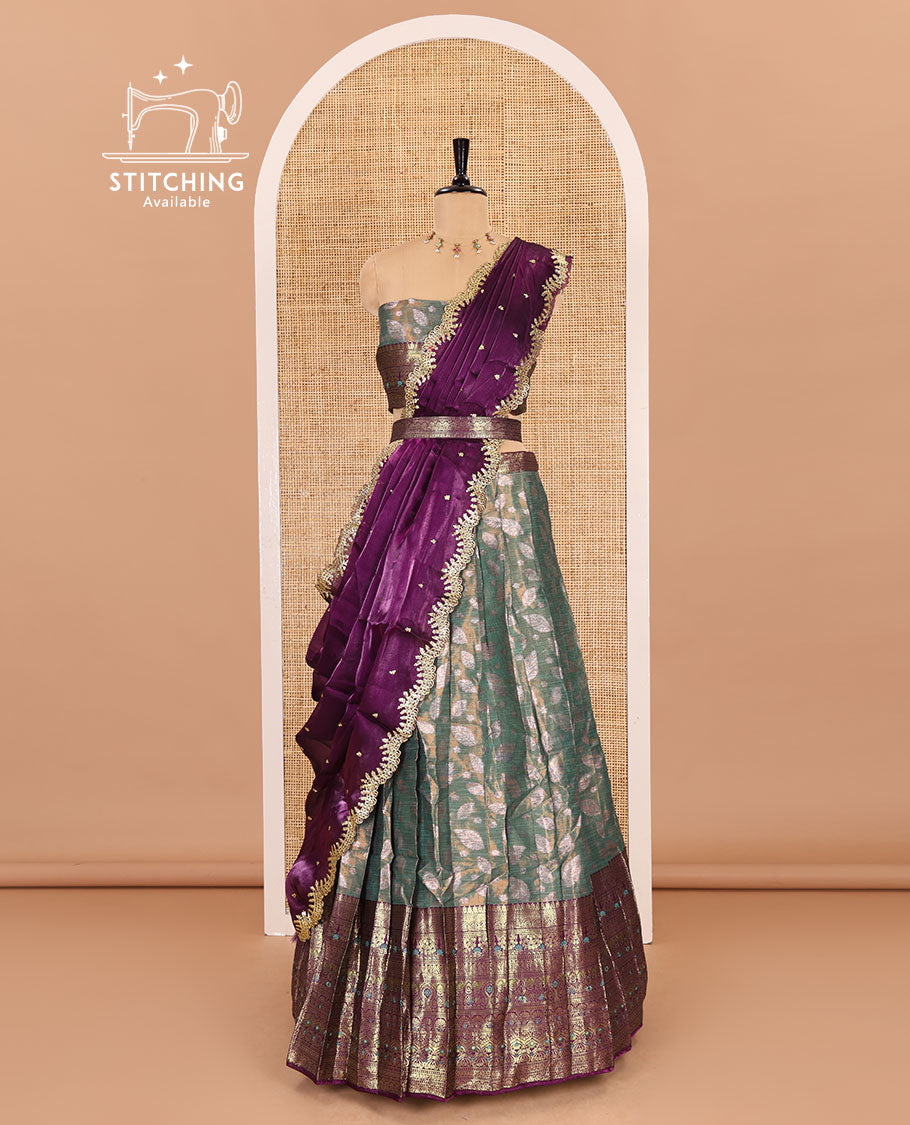 Green and wine half-saree, leaf jacquard with contrast traditional bordered banarasi tissue skirt, a matching blouse, and a contrast scallop embroidered fendi organza dhavani