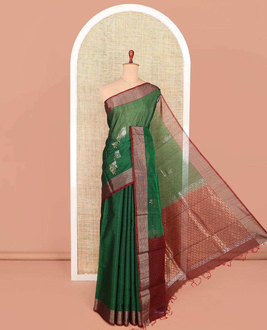Green Silk Cotton Saree, Adorned with Floral Buttas All Over Its Body, Complemented by a Contrast Zari Striped Border, Pallu of Jaal Designs, and Paired with a Contrast Blouse