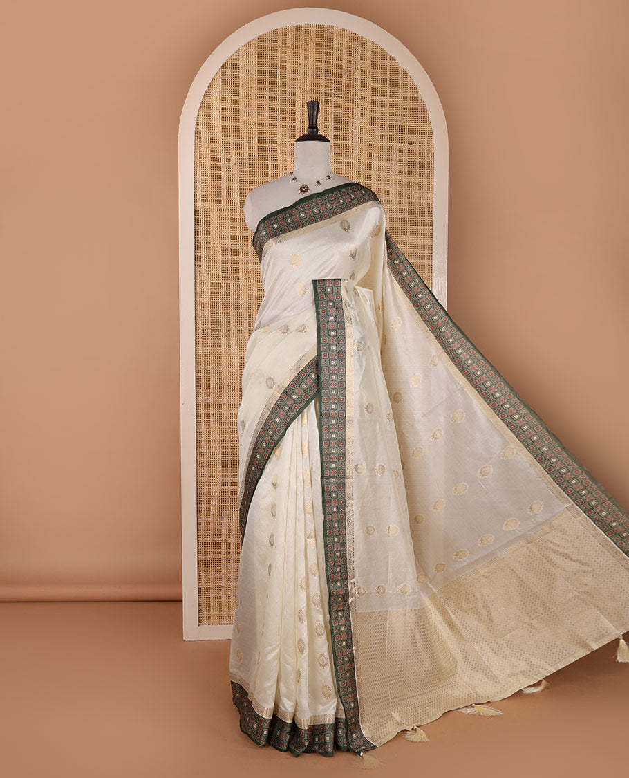 Cream gold zari buttas semi-organza saree, contrast zari & Ajrakh printed green border, zari weaving pallu & Ajrakh printed blouse