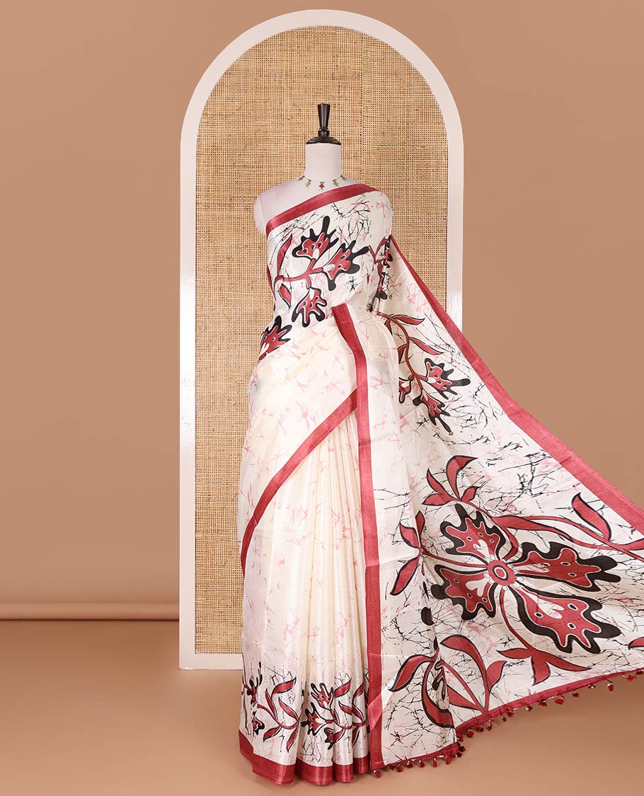 Half-white batik-style floral vine printed khadi cotton saree, contrast red border, batik floral printed, and contrast flower motifs printed blouse