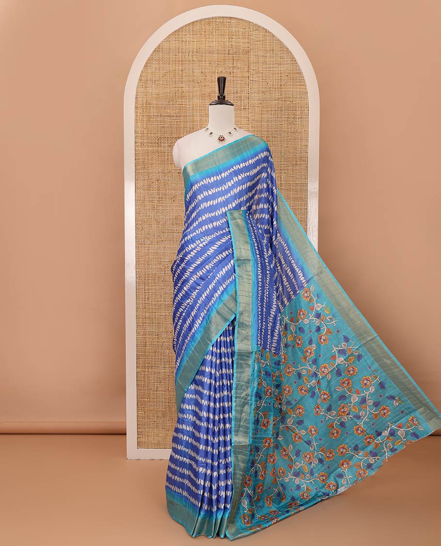 Blue uniquely printed soft tussar saree, contrast zari border, kalamkari floral vine printed pallu & kalamkari printed blouse