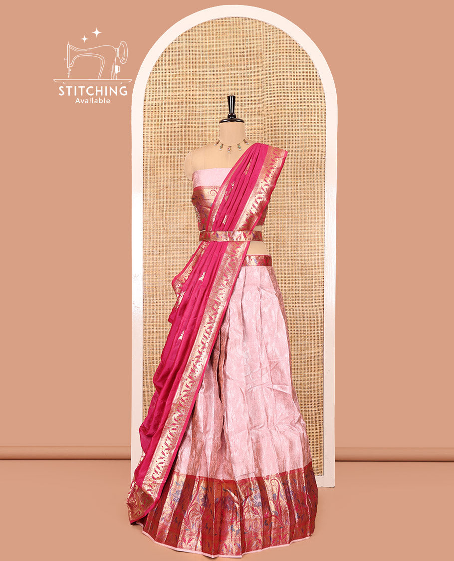 Onion Pink and Rani Pink Half-Saree Set, Subtly Sparkled with Floral Vine Design on Its Banarasi Skirt, Complemented by Contrast Meenakari Floral Design with Embroidered Border, Matching Blouse, and Paired with a Banaras Dupatta