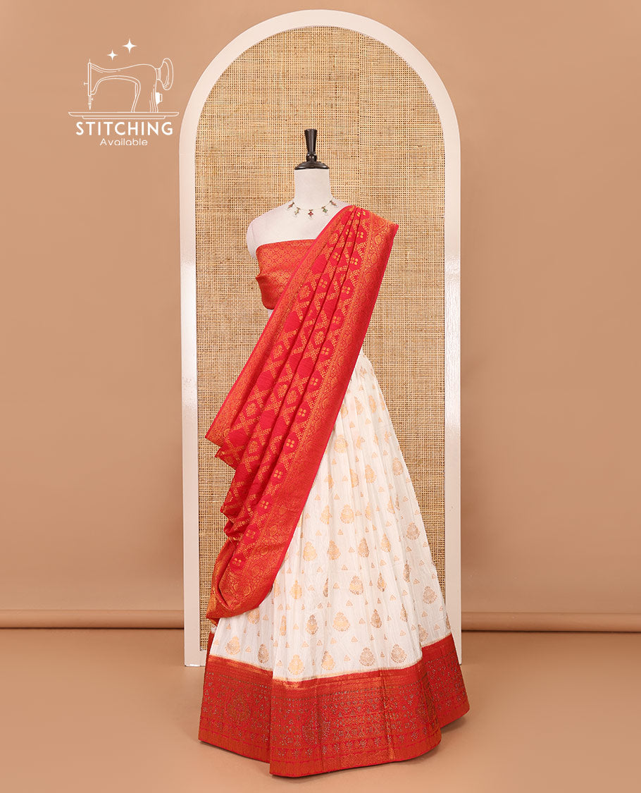 Cream georgette crepe halfsaree,zari buttas & traditional Swarovski stonework red border skirt, jacquard blouse & banarasi jacquard dhavani