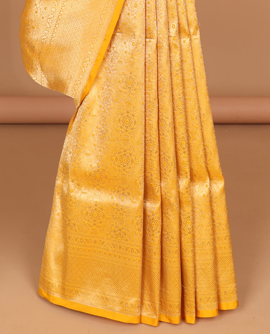 Yellow floral jacquard with self intricate zari design border & floral zari design pallu