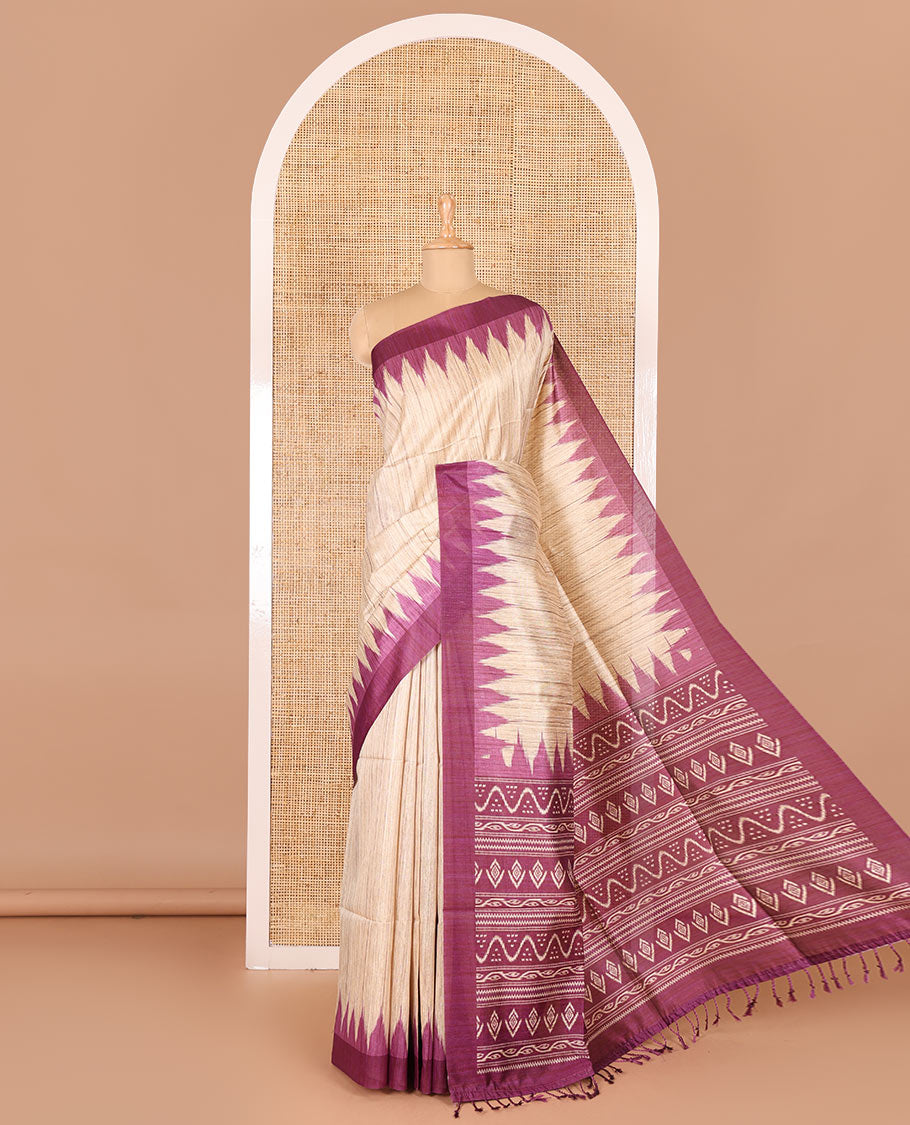 Chikku-purple plain Khicha katan silk saree, contrast purple temple border, ikkat printed pallu with tassels, and a contrast blouse