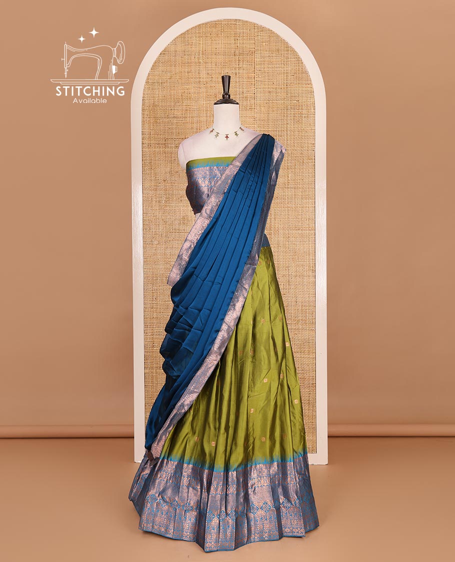 Green taffeta silk half saree, zari buttas with contrast blue traditional zari border skirt, matching zari design blouse, and contrast plain zari border syska georgette dhavani