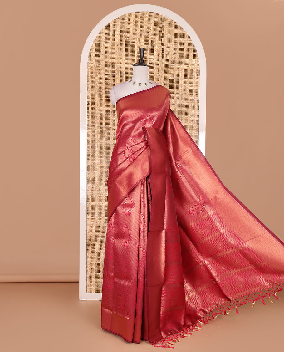 Rani pink paisley zari jacquard Kanchi tissue saree, zari border, pallu steeped with paisleys, and jacquard matching blouse