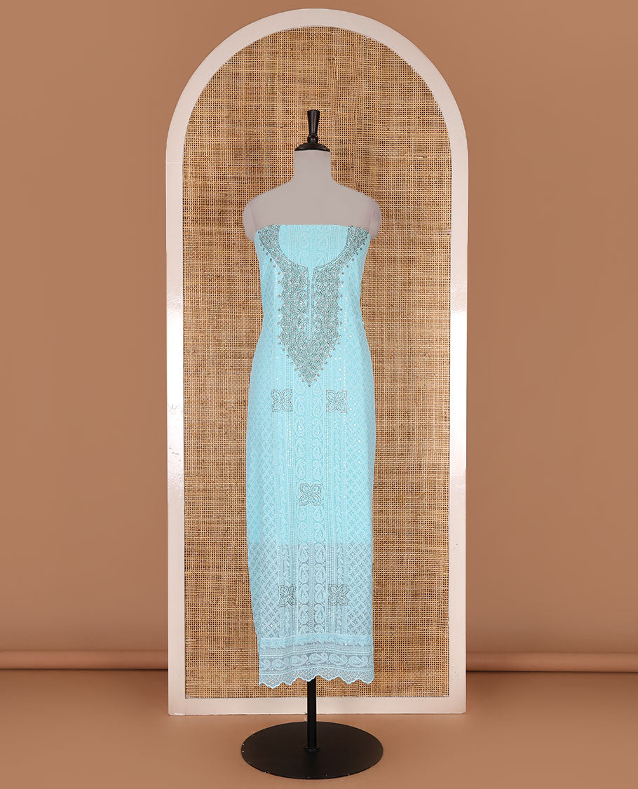 Blue material churidar set, stone work with Schiffli style embroidered georgette top, American Crape bottom, and polka dotted printed mirror work dupatta