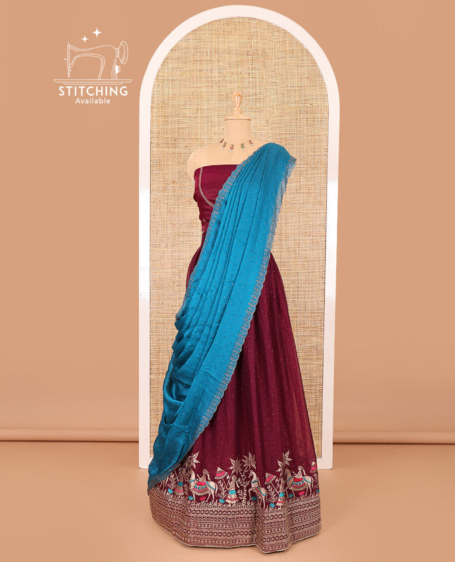 Wine half-saree, Swarovski stone work with girl-on-the-horse motifs embroidered bordered satin georgette skirt, a matching satin georgette blouse, and a contrast Swarovski stone work scallop dhavani
