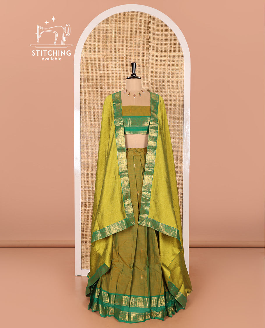 Mehendi Green and Green Chettinad Cotton Half-Saree Featuring Buttas Woven Skirt, Highlighted with a Contrast Rettai Pettu Peacock Motifs Woven Zari Border, a Subtly Woven Matching Blouse, and a Vichitra Silk Contrast Traditional Zari-Bordered Dhavani