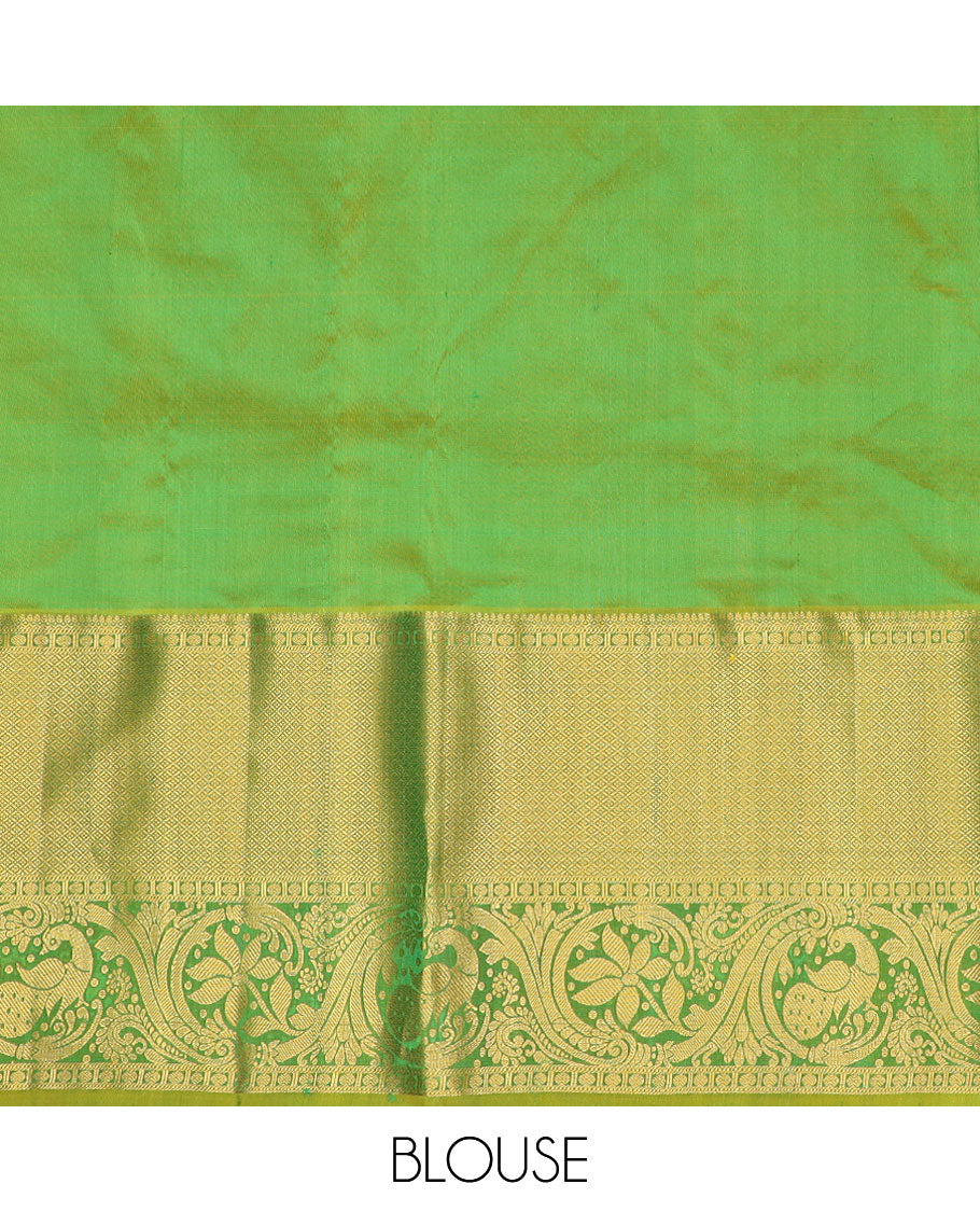 Green floral buttas silk half saree with contrast thilakam mokku, paun design border, zari design blouse & zari design border dhavani