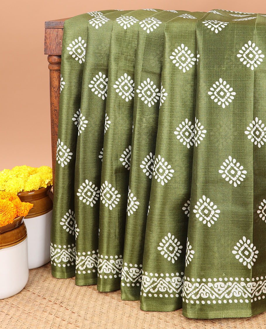 Green small patick print kadhi tussar saree with self design pallu & small butta print blouse