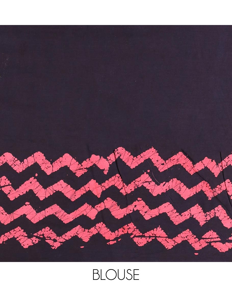 Ink blue wax batik-style zig-zag printed pure cotton saree, gold zari piping border, human figurines batik printed pallu, and a matching blouse