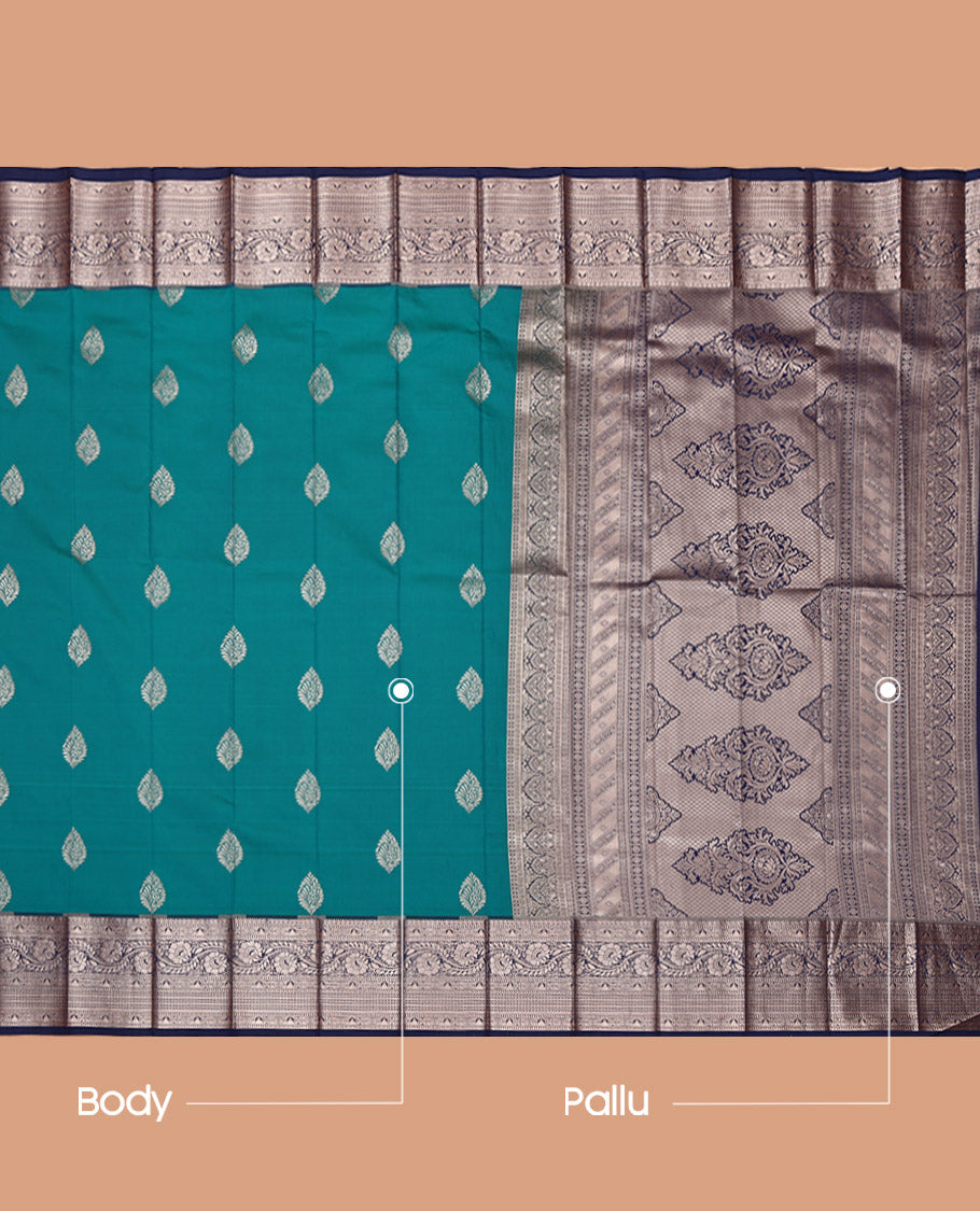 Blue Budget Silk Saree, Adorned with Zari Buttas All Over Its Body, Complemented by a Contrast Traditional Zari Design Woven Border, Mughal-Style Woven Pallu, and Paired with a Contrast Blouse
