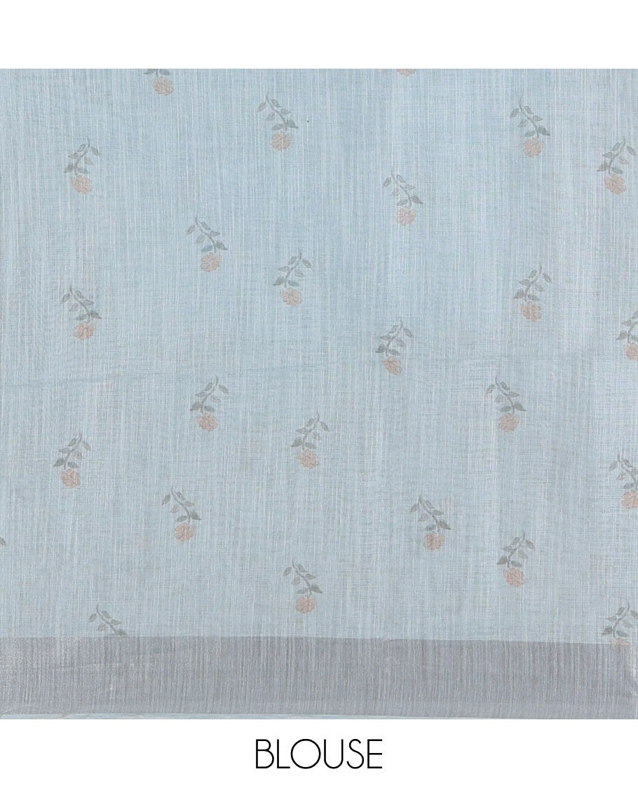 Sky blue nature-theme printed linen cotton saree features flora-fauna motifs, temple bavanji border, nature printed pallu, and a floral motif printed blouse