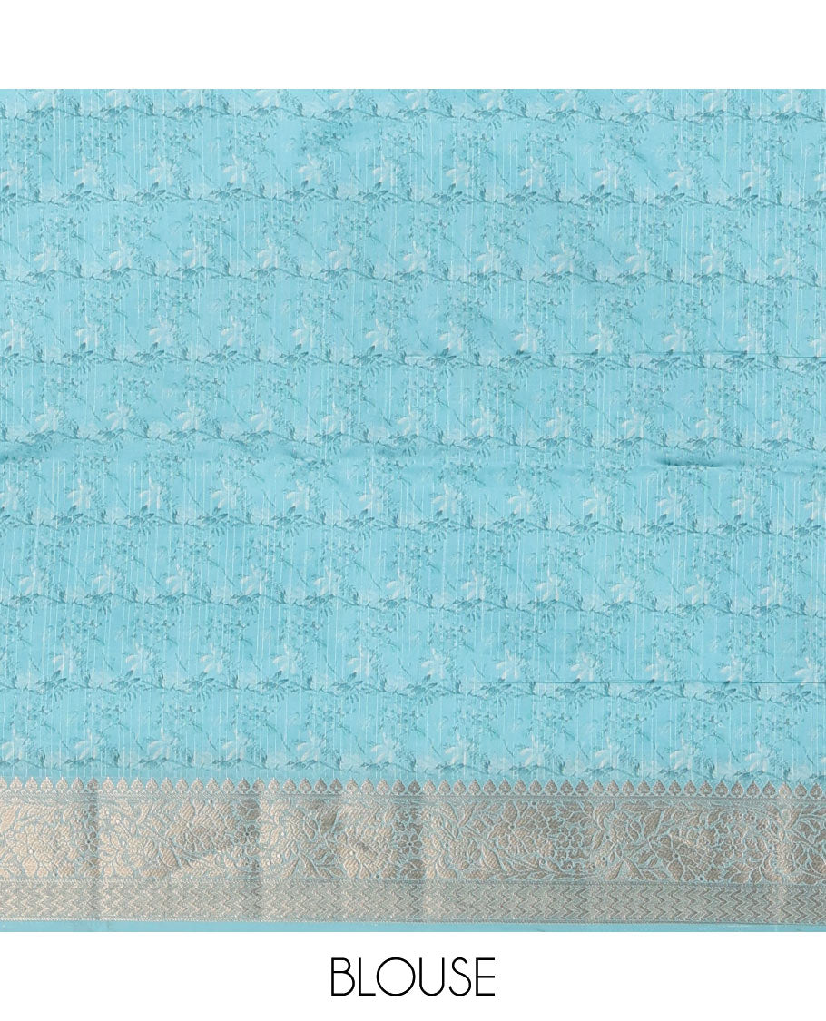 Sky blue tropical floral printed fancy tussar saree, contrast zari traditional design border, intricate Paisley motifs woven zari pallu, and printed blouse