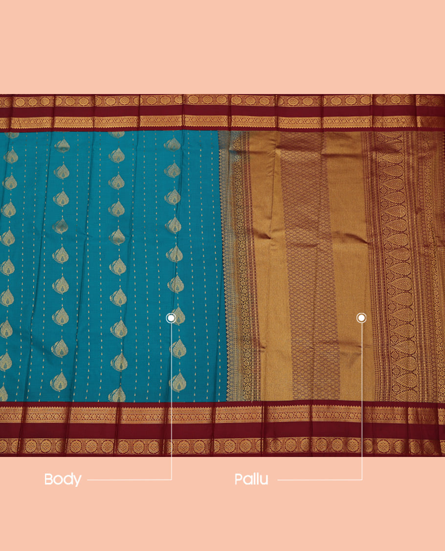 Blue Budget Silk Saree, Adorned with Zari Buttas All Over Its Body, Complemented by a Contrast Traditional Zari Design Rettai Pettu Border, Intricately Designed Pallu, and Paired with a Contrast Blouse