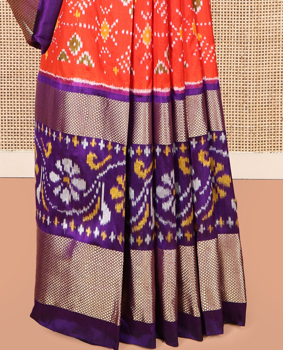 Orange Pochampally Ikat Silk Saree, Accentuated with Intricate Designs, a Contrast Border of Floral Creeper and Peacock-Eye Designs, Floral Creeper Pallu, and a Contrast Blouse