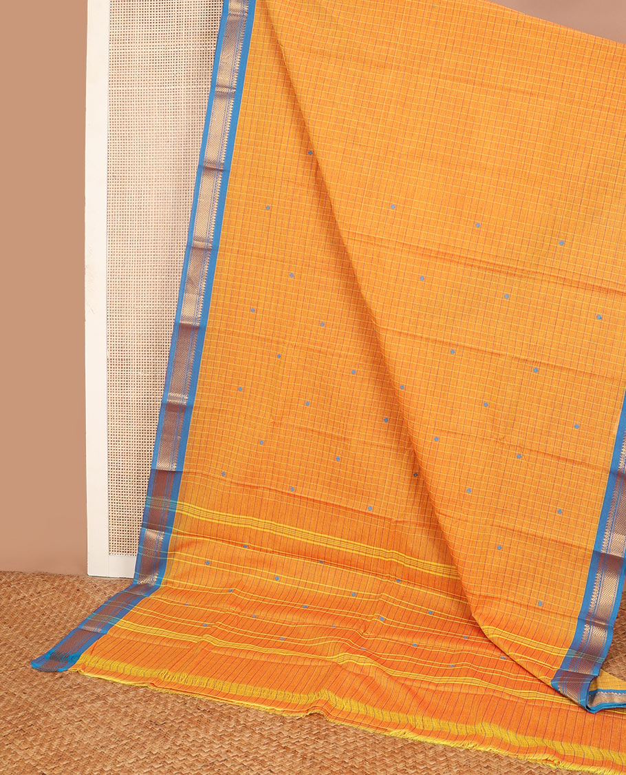 Orange checked Chettinad cotton saree with thread buttas, contrast traditional motif border & striped pallu