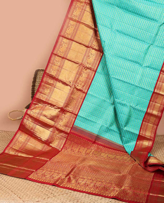 Light Blue striped floral design kanchipuram silk saree with contrast korvai border of manga, banaras, muthu, paun, yaanai design & zari design pallu