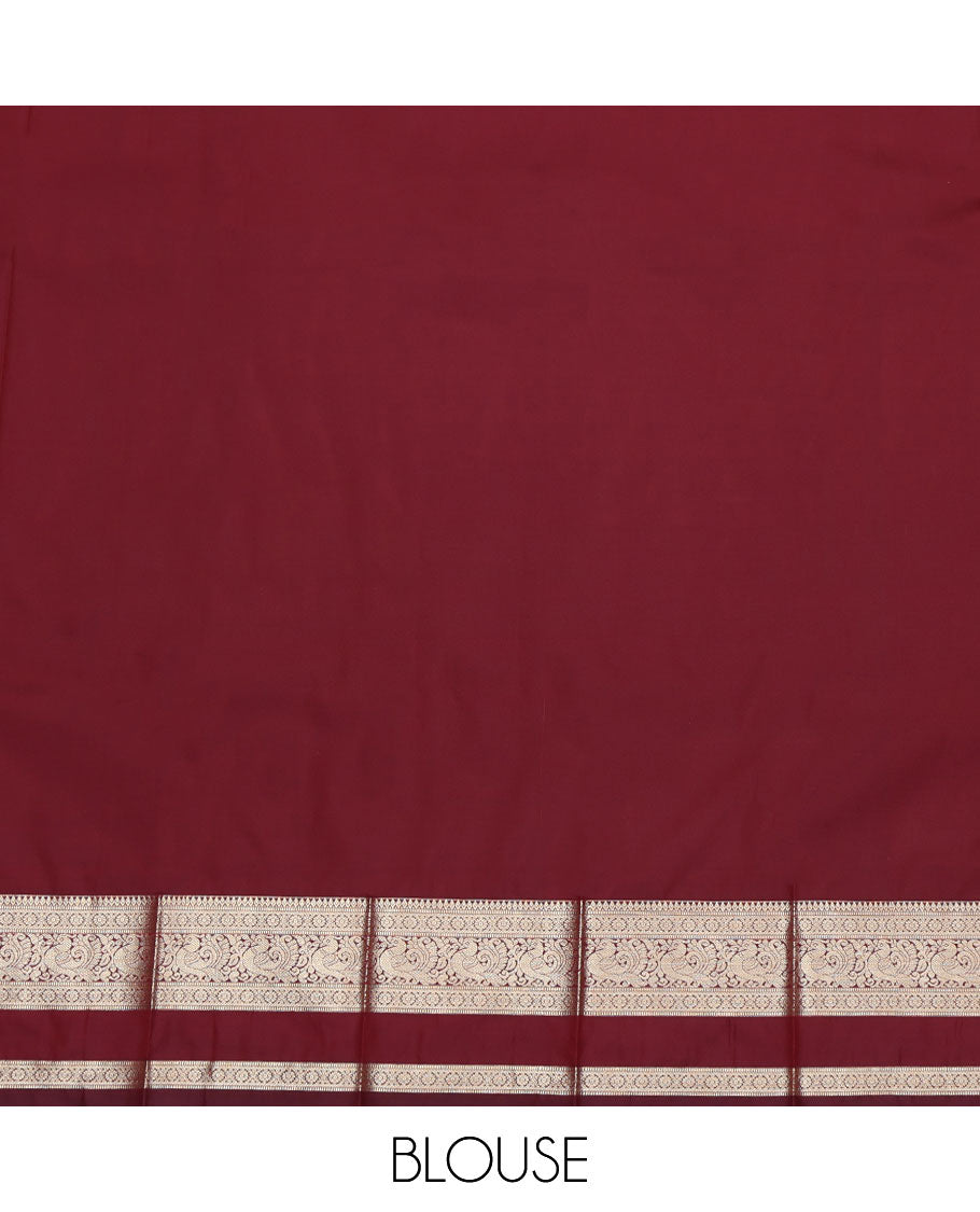 Red Budget Silk Saree, Adorned with Buttas All Over Its Body, Complemented by Contrast Rettai Pettu Traditional Zari Design Border of Peacocks, Jaal Pallu, and Paired with a Contrast Blouse