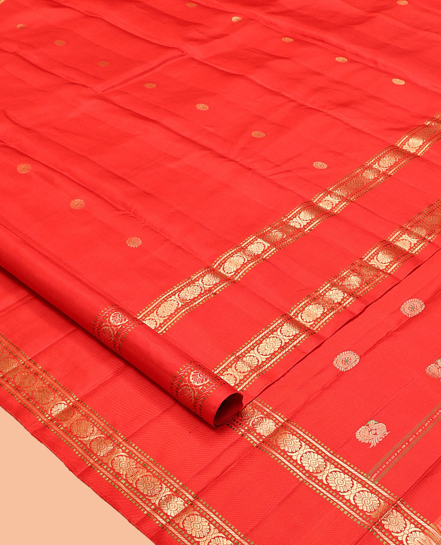 Red Kanchipuram Silk Saree, Woven with Chakram Buttas, a Rettai Pettu Border of Muthu, Banaras, and Cross Kamalam Designs, Mayil-Chakram Pallu, and a Matching Blouse