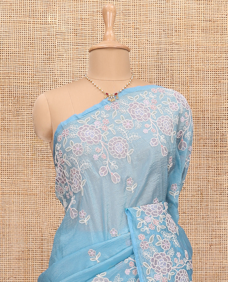 Blue floral motifs thread embroidered tissue saree, floral vine embroidered border, and pallu
