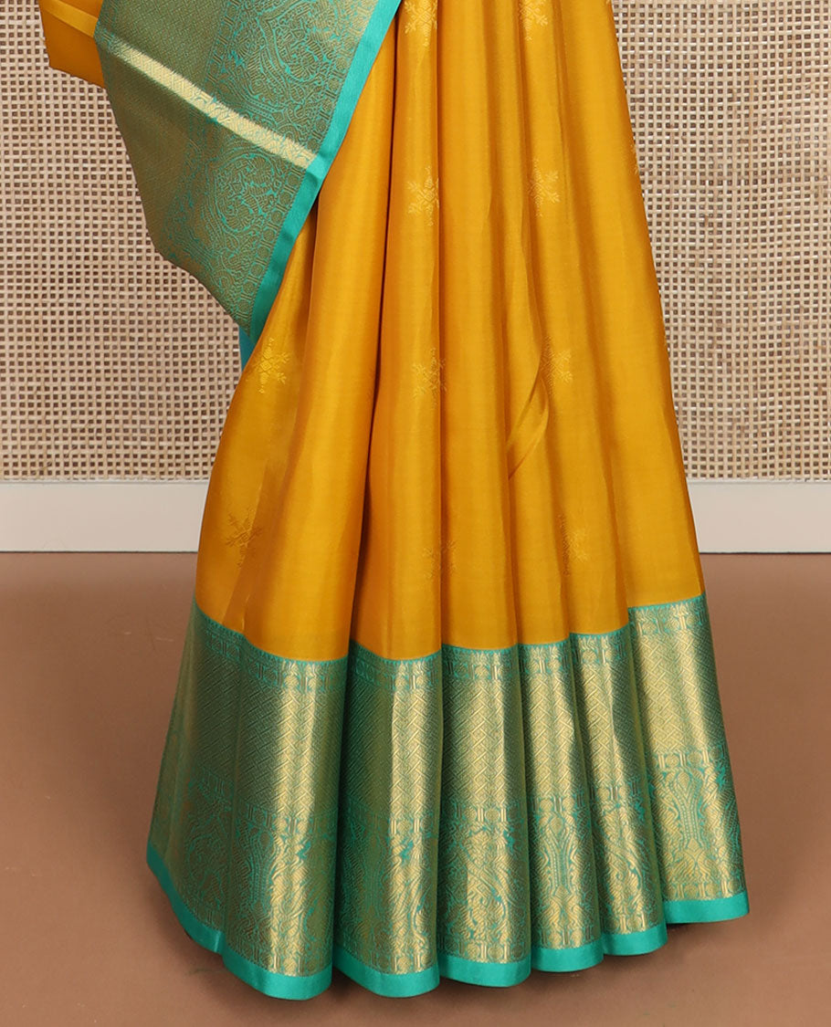 Yellow zari buttas vasundhara silkmix saree,contrast intricate pallu & border of poun,banaras,paayadi kann,mayil & yaali