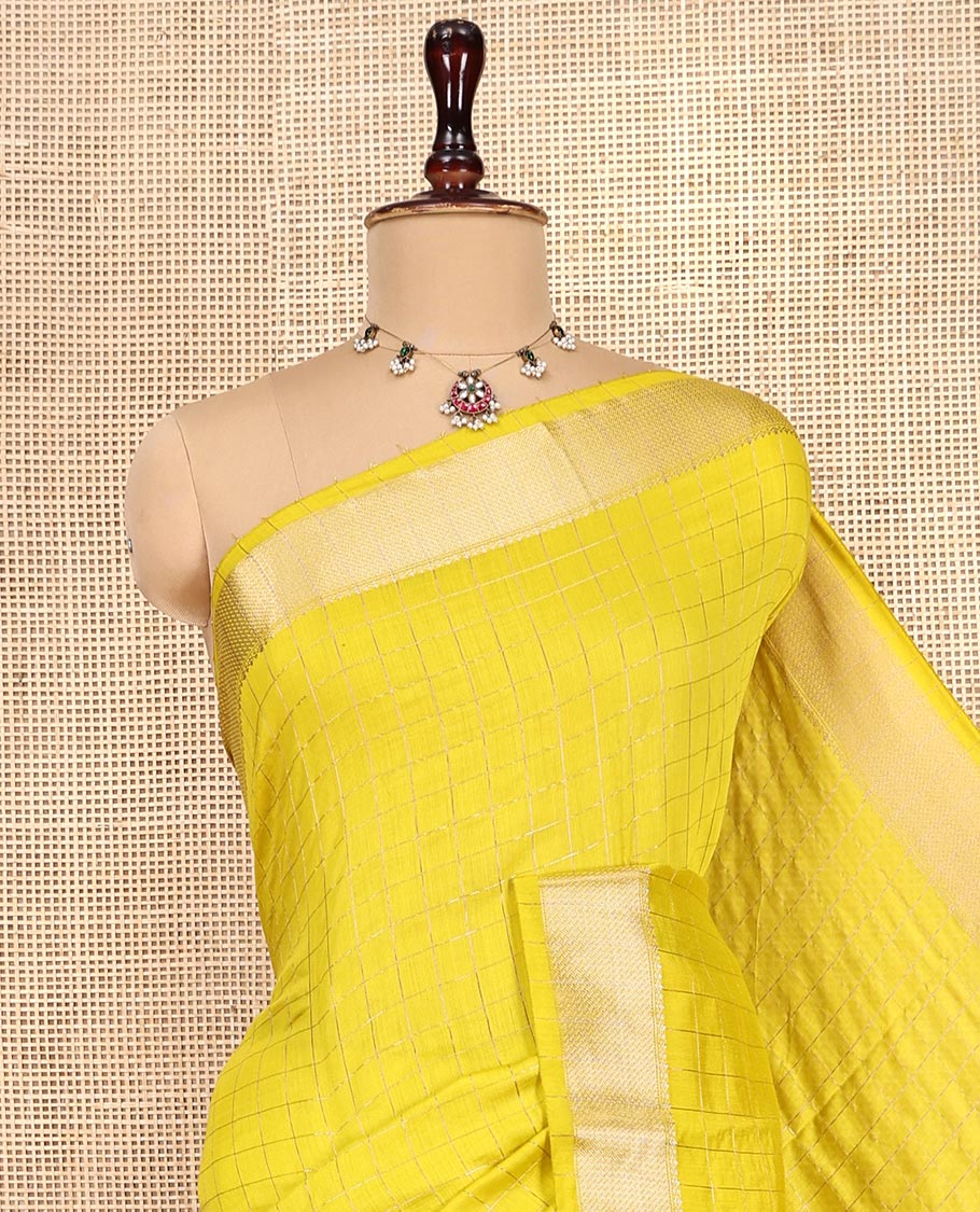 Yellow Assam Silk Saree, Sparsely Threaded with Zari Checks, Highlighted by a Traditional Zari Border, Zari Design Pallu, and a Matching Blouse