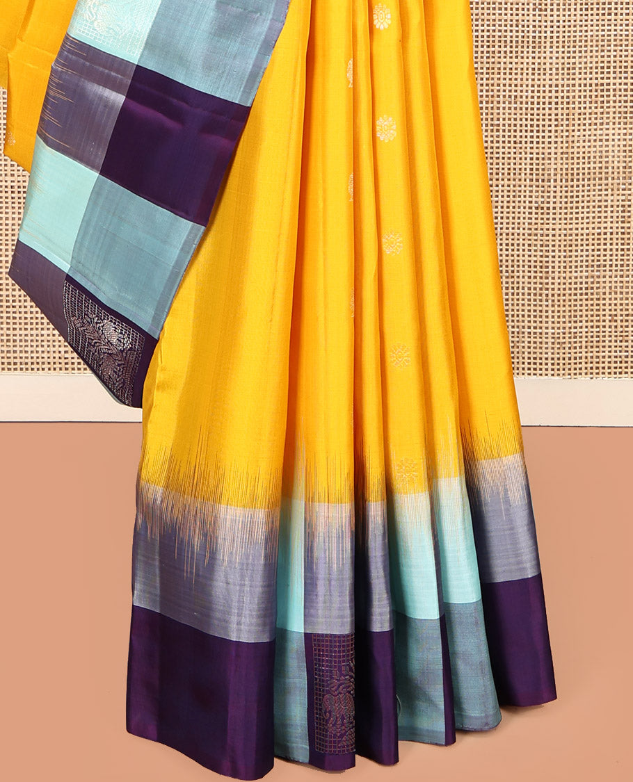 Yellow Kanchipuram Silk Saree, Sparsely Sparkled with Mayil-Chakram Buttas, Complemented by a Contrast Checked Yaanai Motif Border, Floral Pallu, and a Contrast Blouse