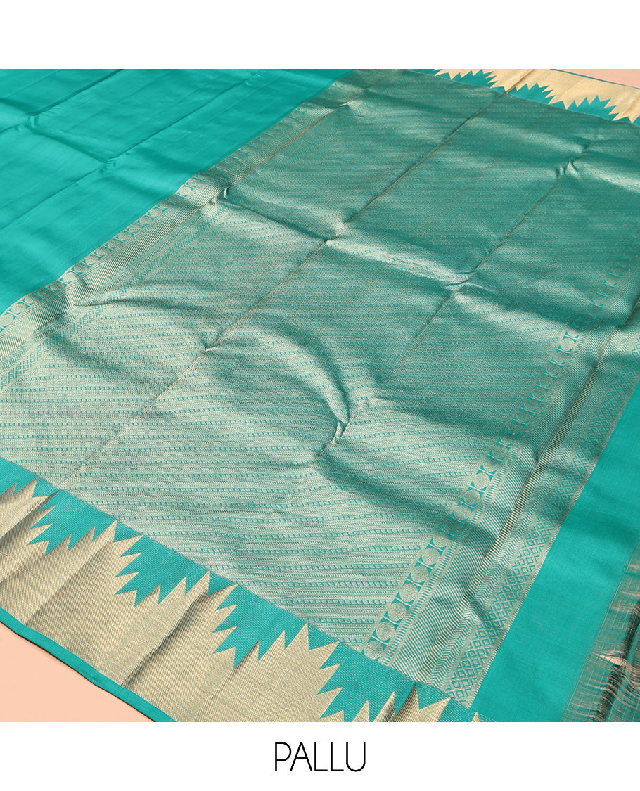 Green Plain Kanchipuram Silk Saree, Highlighted by a Zari Thazampoo Rekku Border, Geometric Patterned Pallu, and Matching Blouse
