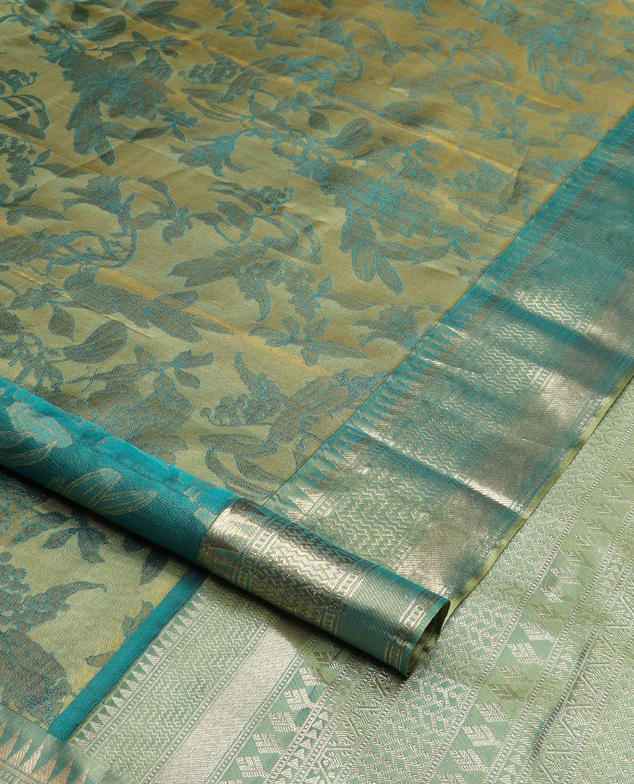 Green floral brocade Kanchipuram silk saree, zari border and pallu steeped with geometric patterns