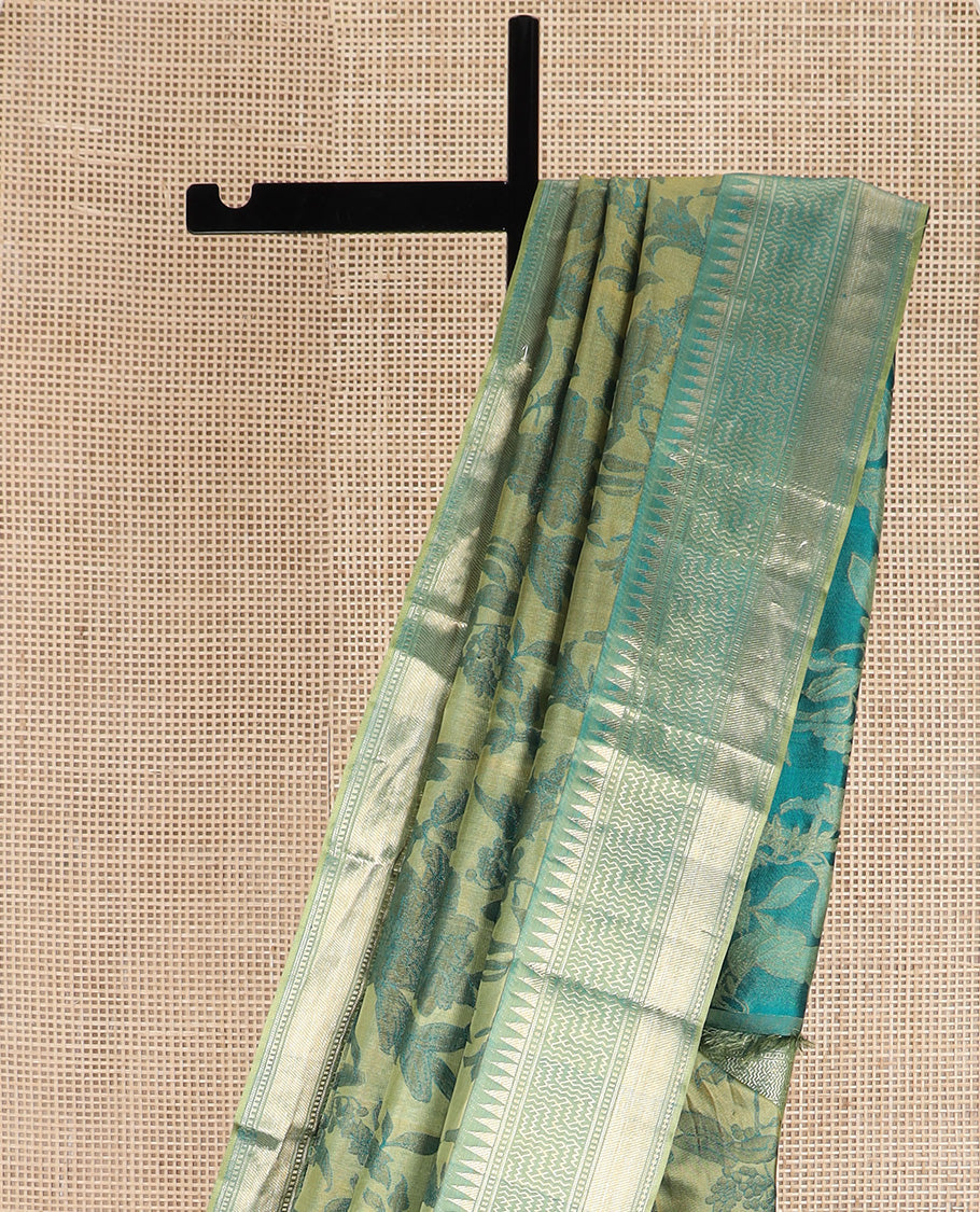 Green floral brocade Kanchipuram silk saree, zari border and pallu steeped with geometric patterns