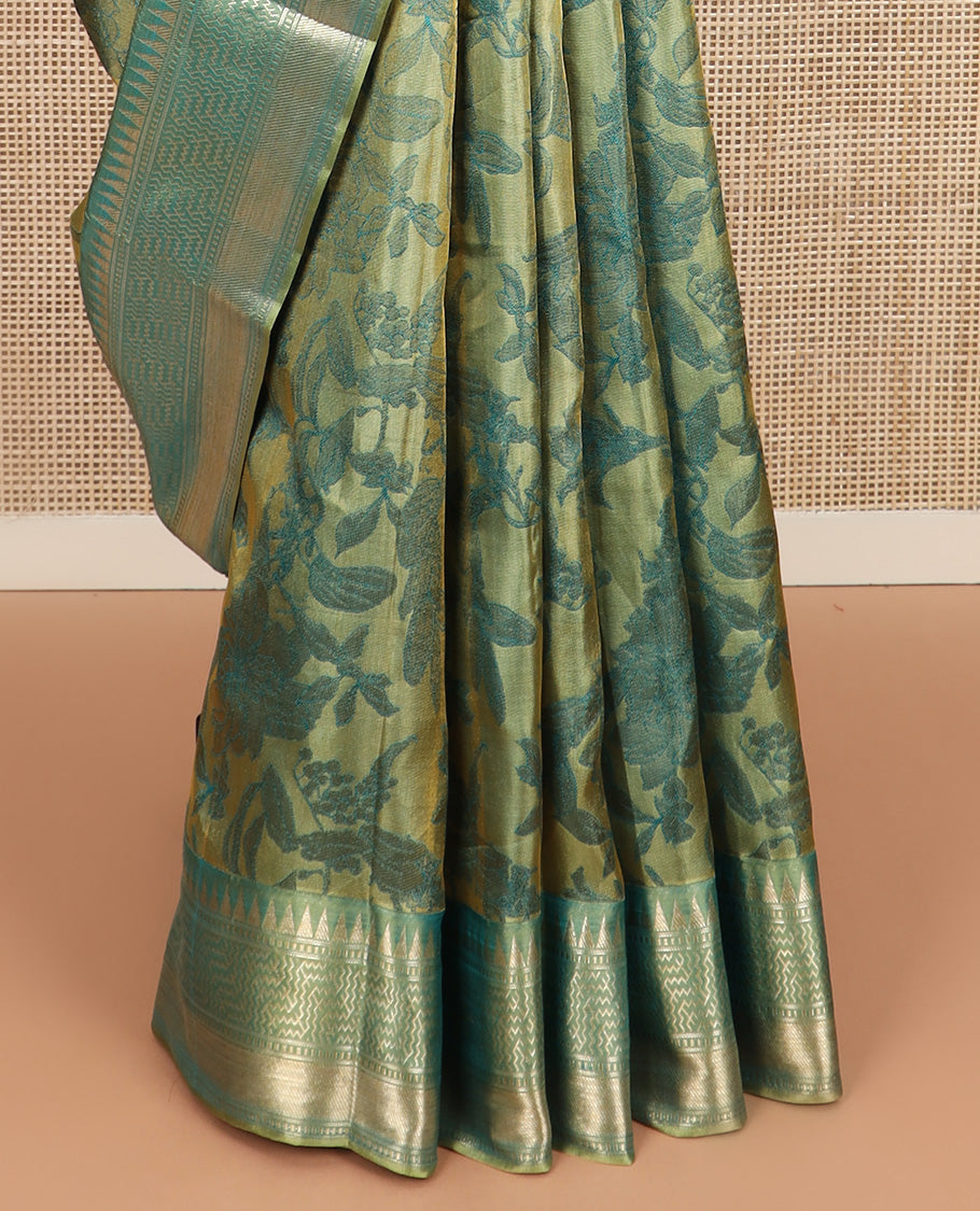 Green floral brocade Kanchipuram silk saree, zari border and pallu steeped with geometric patterns