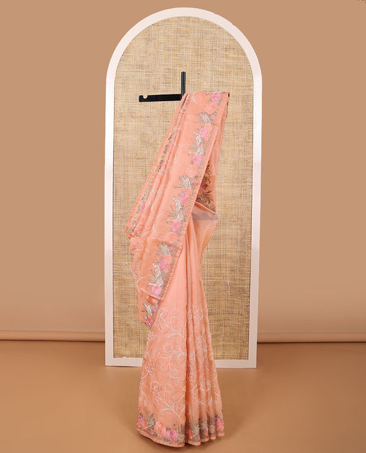 Orange floral thread embroidery organza saree with self floral, bird embroidery border