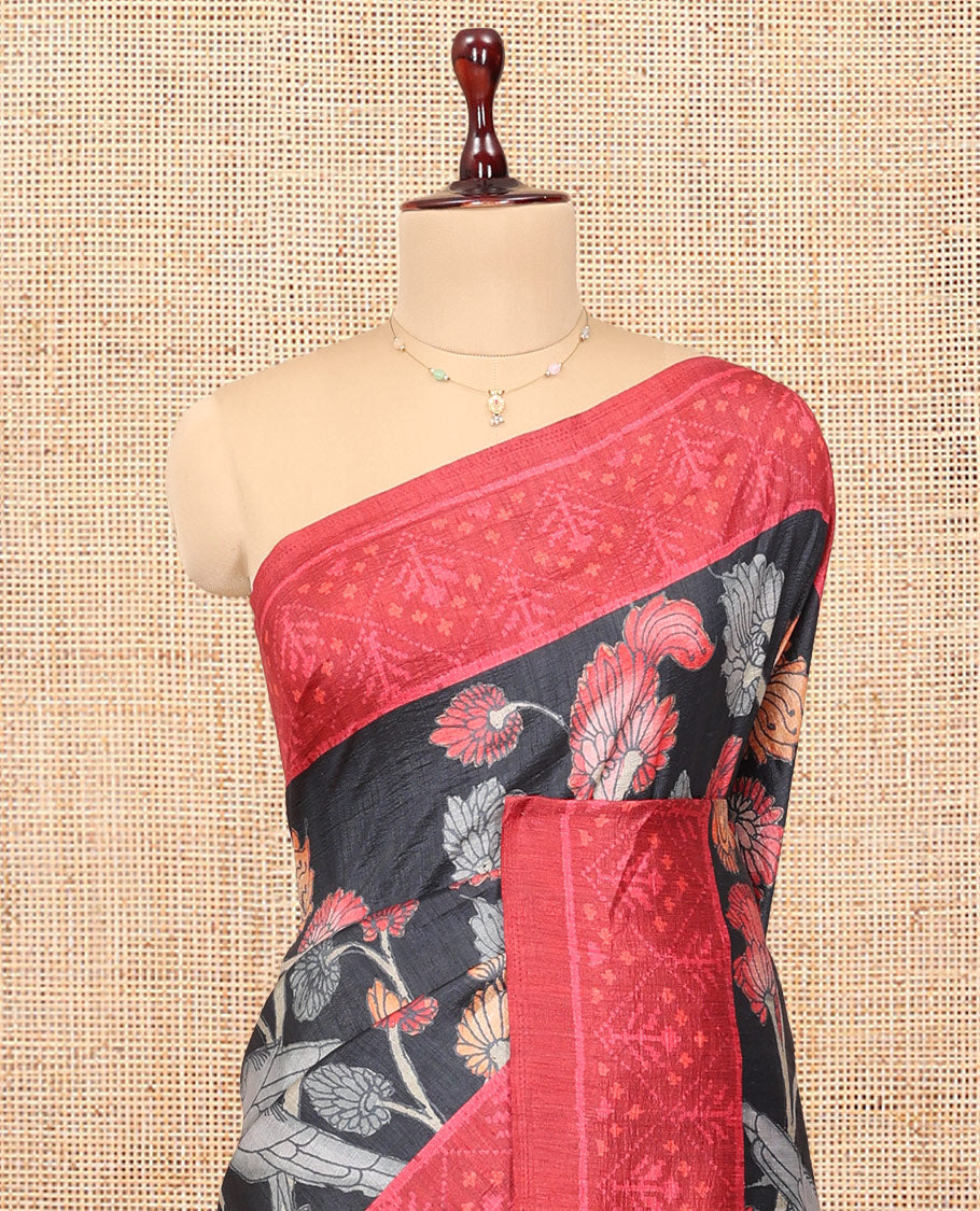 Black Fancy Tussar Saree Features Kalamkari Floral Vine and Bird Print, Contrast Patola Border, Patola Pallu, and a Contrast Blouse