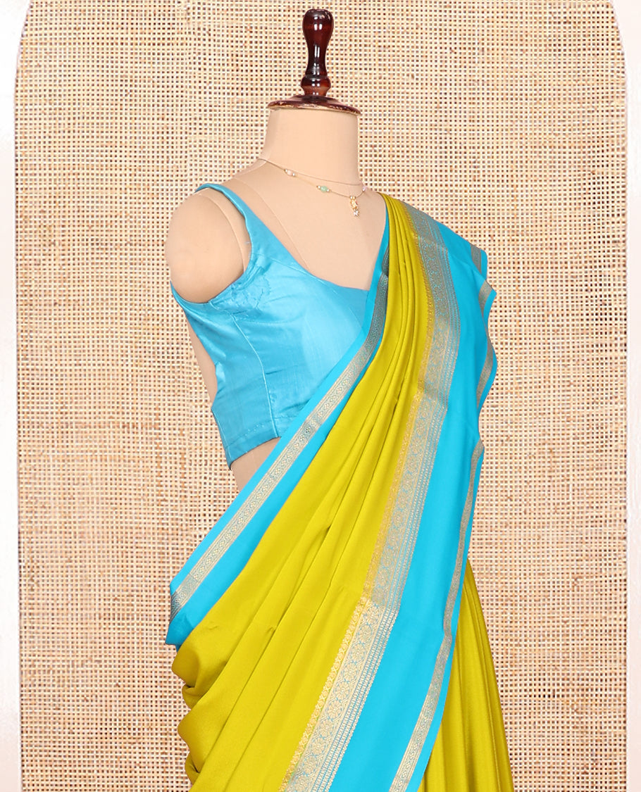 Green Plain Mysore Silk Saree, Complemented by Captivating Contrast Border of Traditional Zari Designs, Subtly Striped Pallu, and Paired with a Contrast Blouse