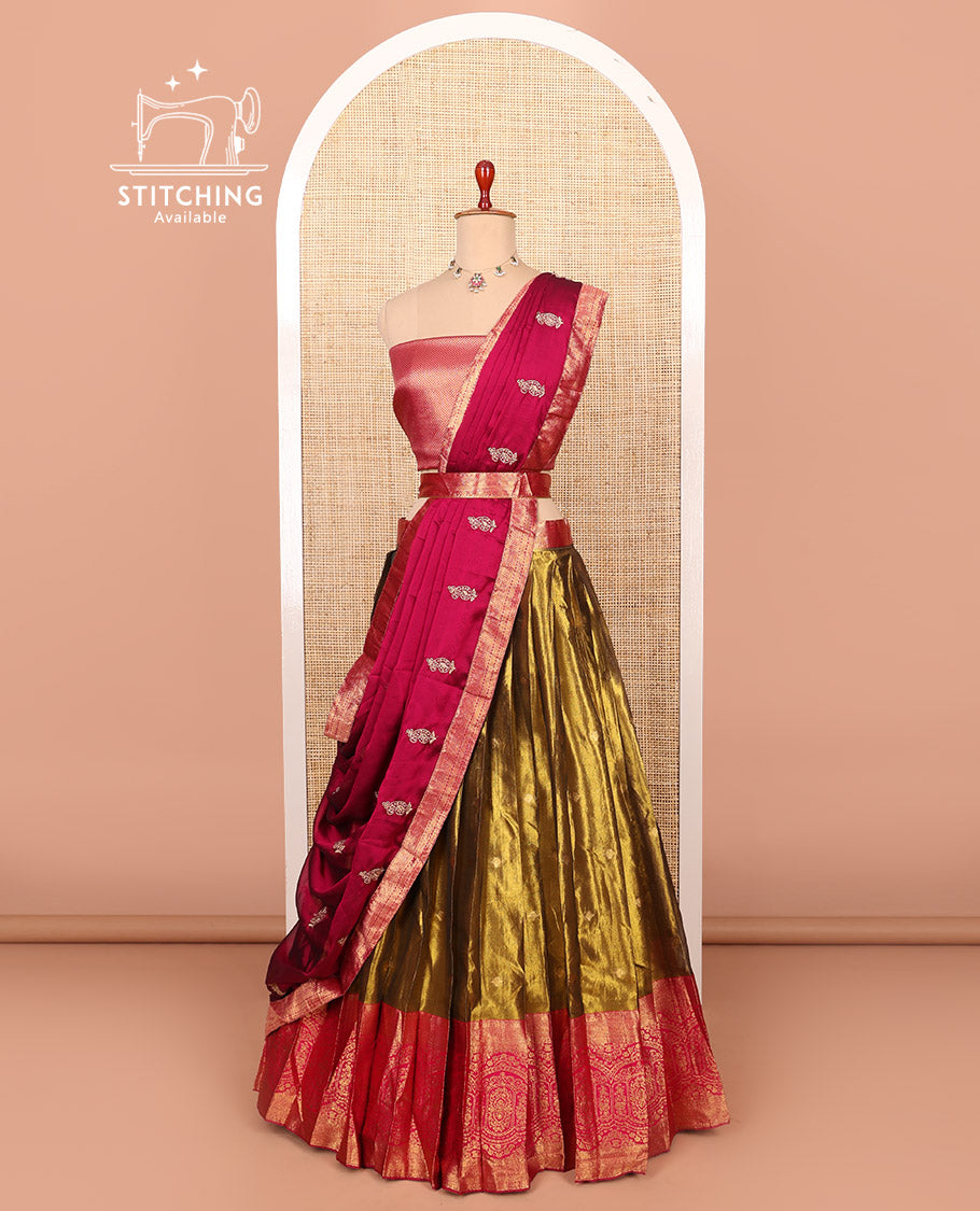 Gold-magenta zari buttas half-saree with contrast intricate motifs woven bordered skirt, brocade blouse, and a zari design dhavani