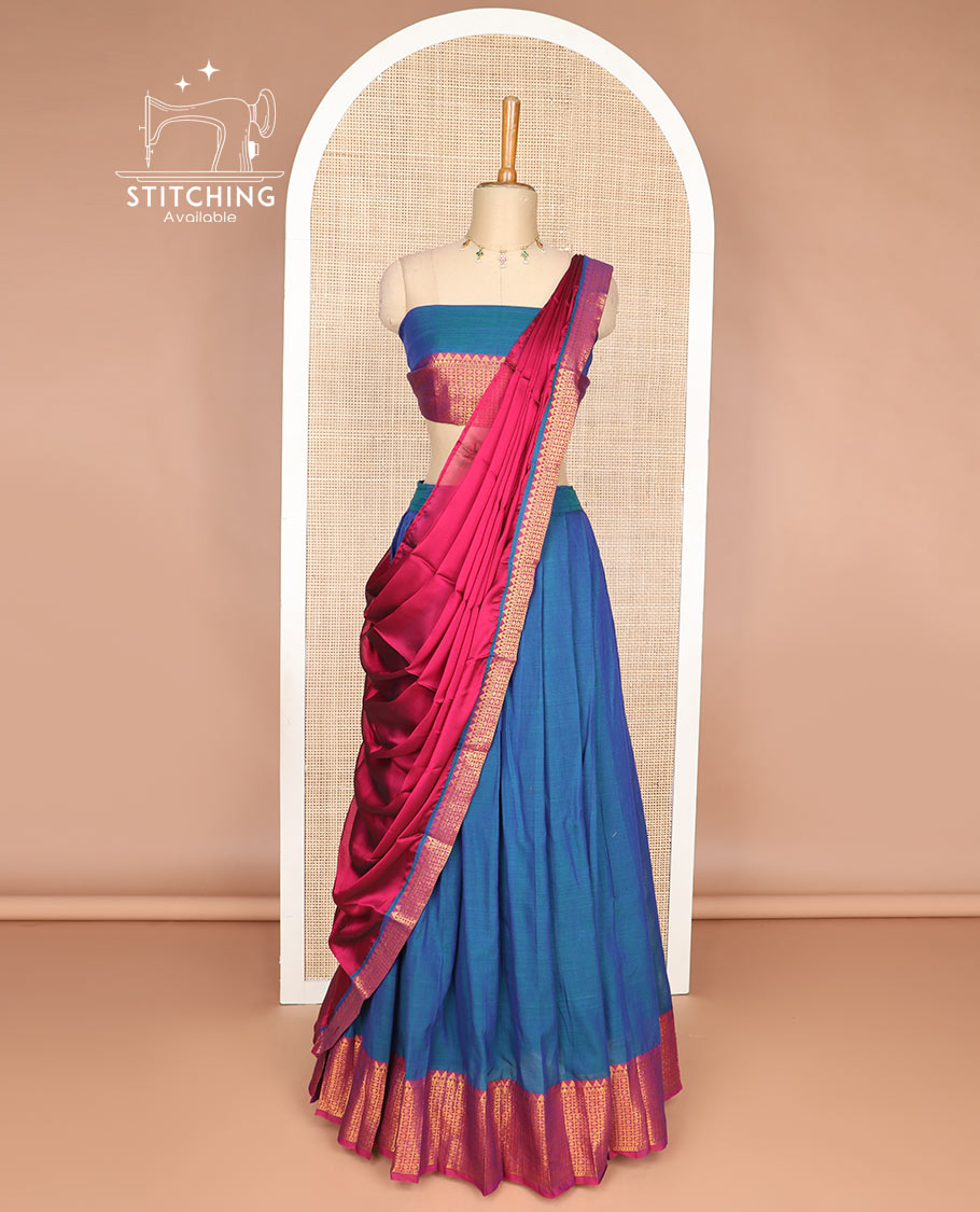 Blue cotton half saree with contrast checked, temple border, zari design blouse & temple border dhavani
