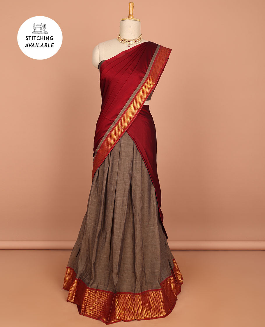 Pink cotton half saree with contrast traditional border , plain blouse & plain dhavani with zari design border