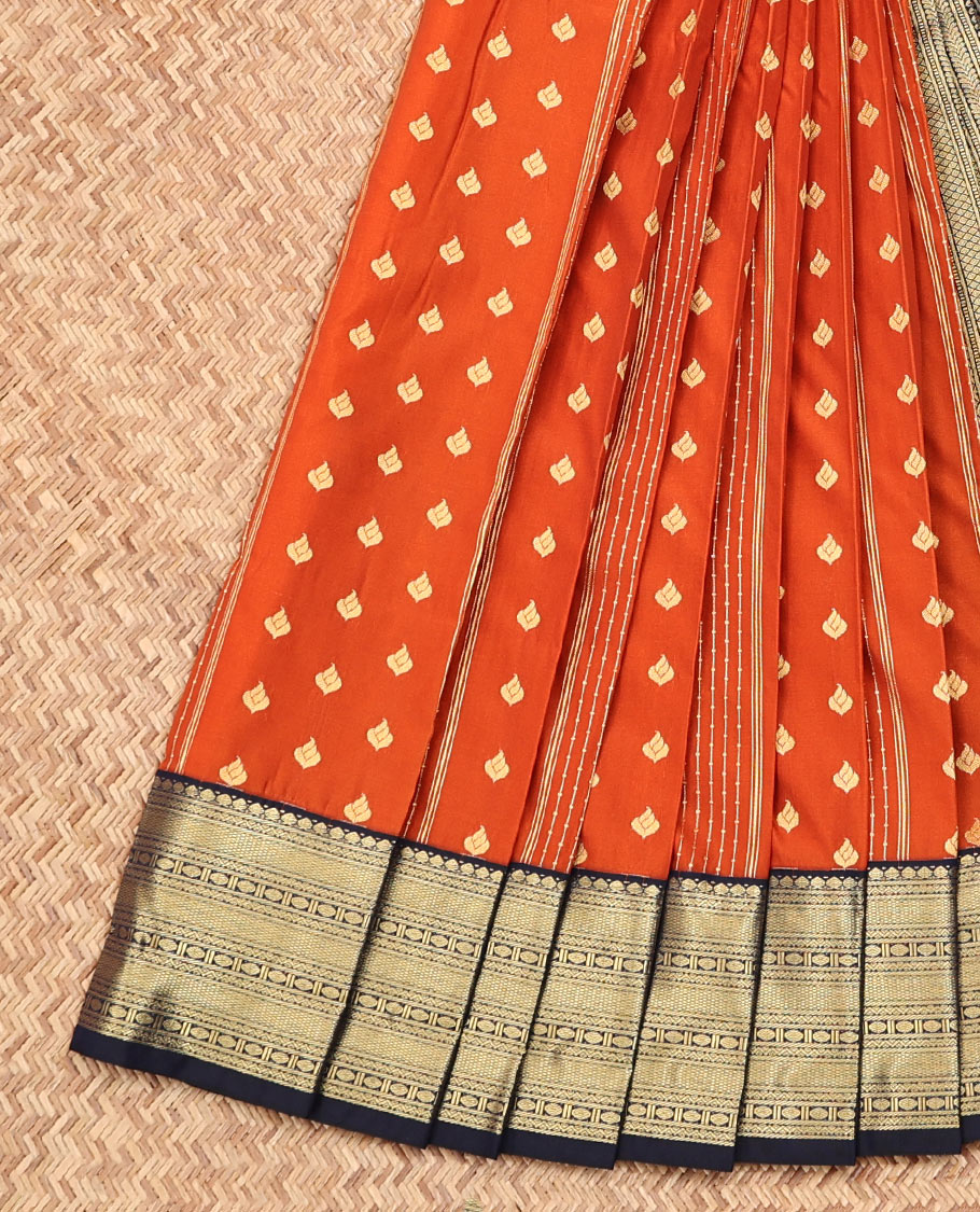 Rust Budget Silk Saree, Mesmerized with Buttas and Stripes on Its Body, Complemented by a Contrast Traditional Zari Design Border, Geometric-Patterned Pallu, and Paired with a Contrast Blouse